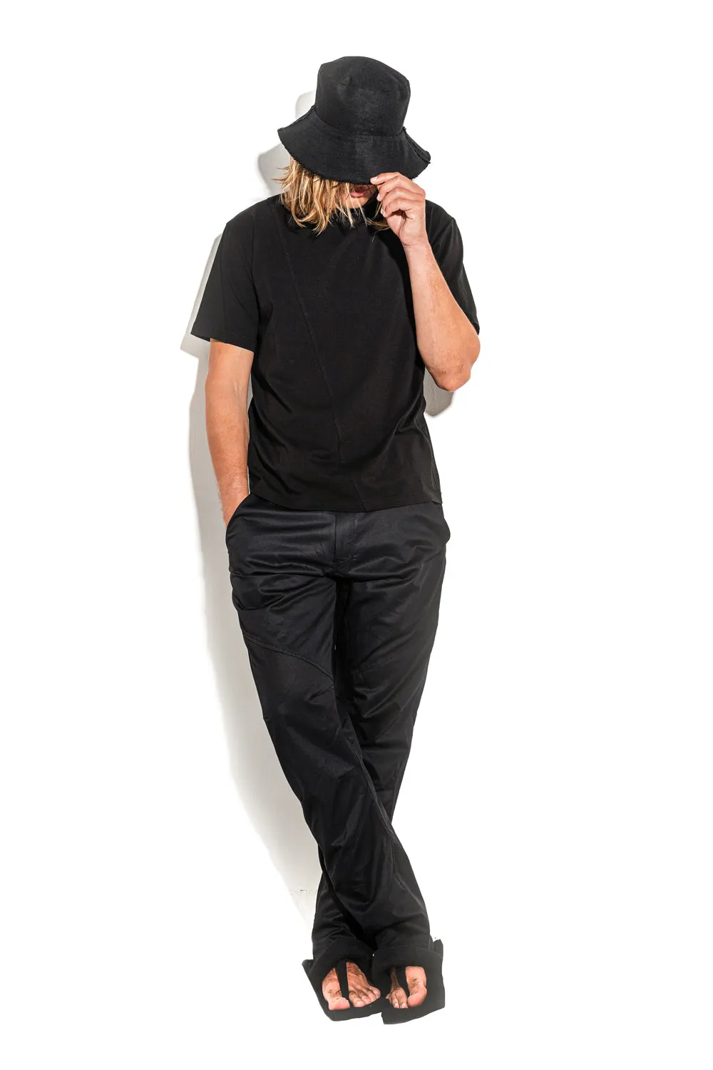 Black T-shirt with a geometric seam